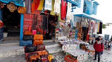 A tourist looks at traditional souvenirs displayed for sale in Sidi Bou Said, an attractive tourist destination near Tunis, Tunisia January 7, 2019. (File photo: Reuters)