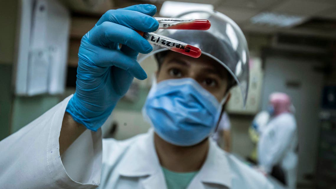 An Egyptian medical worker checks blood donated from a person who recovered from Covid-19 inless at the National Blood Transfusion centre in Cairo on July 22, 2020. (File photo: AFP)