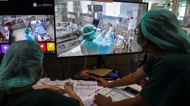 ICU nurses wearing face masks work and monitor the live footages of patients suffering from the coronavirus disease (COVID-19) in the Intensive Care Unit (ICU) at the King Chulalongkorn Memorial Hospital in Bangkok, Thailand, on May 11, 2021. (Reuters)