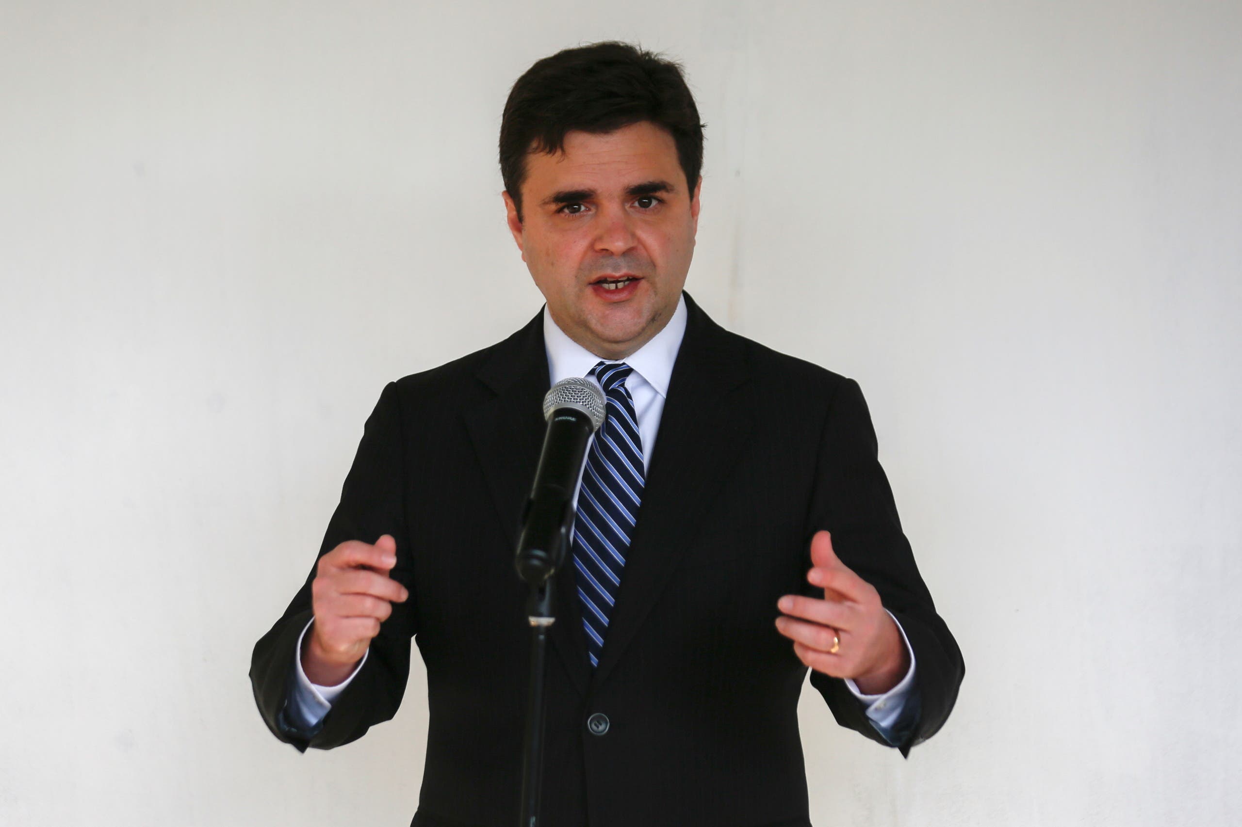 Ricardo Zuniga, US President Joe Biden's special envoy for the Northern Triangle, speaks with the media after a TV interview in San Salvador, El Salvador May 12, 2021. (Reuters)