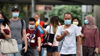 Singapore PM says can relax social curbs if local virus situation improves