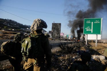 قوات إسرائيلية عند حدود غزة (رويترز)