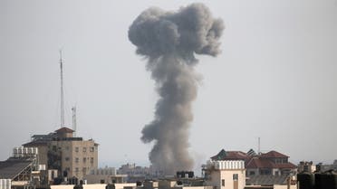 Smoke rises following an Israeli air strike, amid Israeli-Palestinian fighting, in Gaza, May 20, 2021. (Reuters)