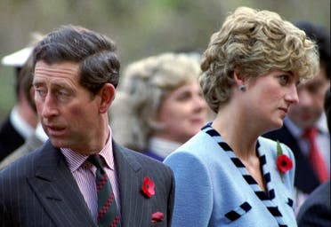 Princess Diana and Prince Charles look in different directions, during a service held to commemorate the 59 British soldiers killed in action during the Korean, on November 3, 1992. (Reuters)
