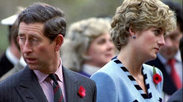 Princess Diana and Prince Charles look in different directions, during a service held to commemorate the 59 British soldiers killed in action during the Korean, on November 3, 1992. (Reuters)