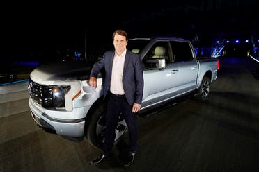 Jim Farley, Ford CEO, stands next to the company's new Ford F-150 Lightning, May 19, 2021. (AP)