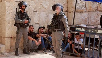 Israeli police fire stun grenades at stone-throwing Palestinians in Jerusalem 