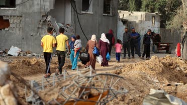 Palestinians return to her neighbourhood hit by Israeli bombardment in Gaza City, after a ceasefire brokered by Egypt between Israel and Hamas, on May 21, 2021. (File photo: AFP)