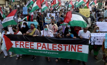 من مسيرة تضامن سابقة مع الفلسطينيين في كراتشي بباكستان أمس الخميس