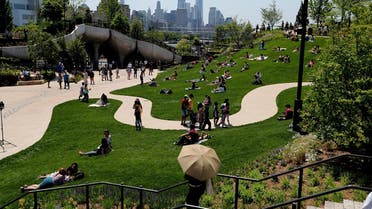 People visit Little Island Park, a new public park space which sits on stilts over the Hudson River during opening day in New York. (Reuters)
