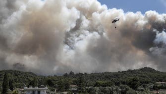Firefighters battle forest fire near Greece’s Athens for third day 