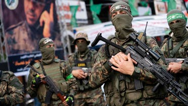  Hamas militants parade through the streets for Bassem Issa, a top Hamas' commander, who was killed by Israeli Defense Force military actions prior to a cease-fire reached after an 11-day war between Gaza's Hamas rulers and Israel, in Gaza City, Saturday, May 22, 2021. (AP)