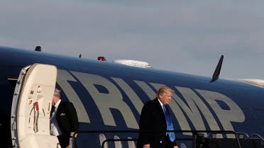 Then-US President-elect Donald Trump departs his plane in Baltimore, Dec. 10, 2016. (Reuters)