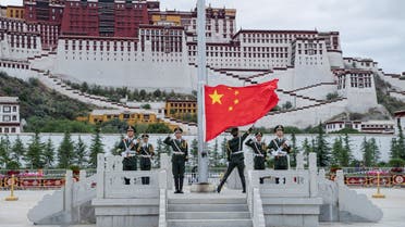 The Chinese national flag is raised during a ceremony marking the 96th anniversary of the founding of the Communist Party of China (CPC) at Potala Palace in Lhasa, Tibet Autonomous Region, China, July 1, 2017. (File photo: Reuters)