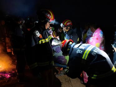 Rescue workers work at the site where extreme cold weather killed participants of an 100-km ultramarathon race in Baiyin, Gansu province, China May 22, 2021. (Reuters)