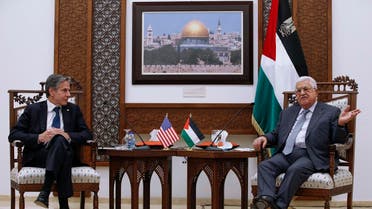 Palestinian President Mahmoud Abbas, right, and US Secretary of State Antony Blinken hold a joint press conference in the West Bank city of Ramallah, May 25, 2021. (AP)