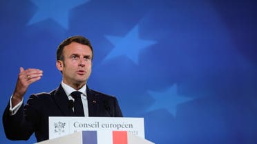 French President Emmanuel Macron gestures as he addresses media representatives at a press conference on the second day of an EU summit at the European Council building in Brussels, Belgium, May 25, 2021. John Thys/Pool via REUTERS