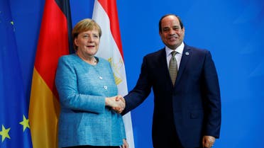 German Chancellor Angela Merkel shakes hands with Egyptian President Abdel Fattah al-Sisi during a news conference at the Chancellery in Berlin, Germany, October 30, 2018. REUTERS/Hannibal Hanschke