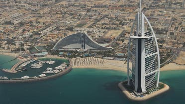 An aerial view of Dubai's Burj al Arab. (Unsplash, Roman Logov)