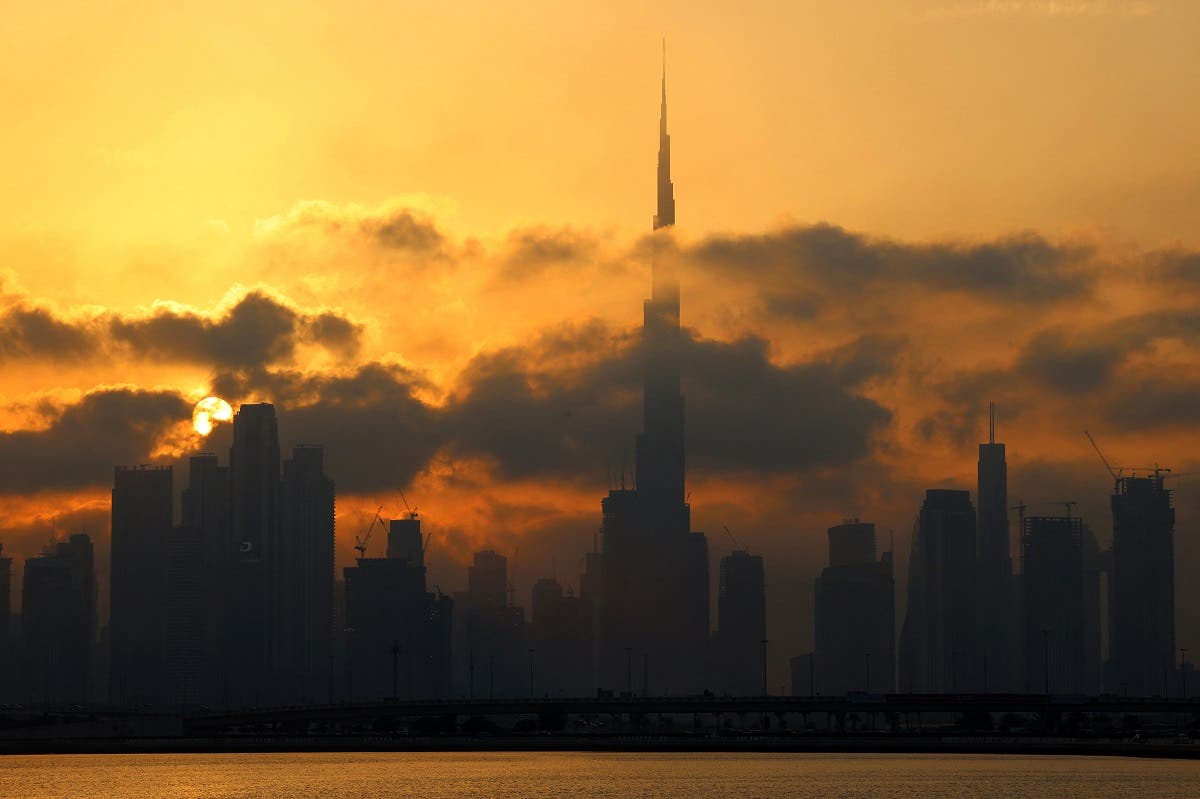 A view of the skyline of downtown Dubai with Burj Khalifa, at sunset. (AFP)