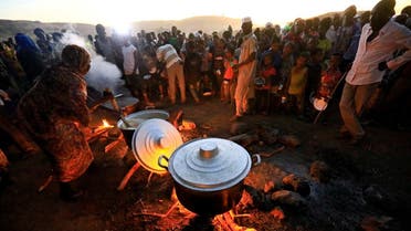Ethiopian refugees fleeing from the fighting in Tigray region, wait for food at the Um Rakoba camp, on the Sudan-Ethiopia border, in al-Qadarif state. (File photo: Reuters)