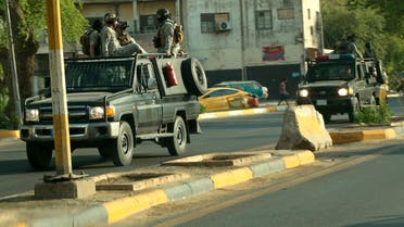 عناصر من القوات الأمنية في بغداد (أسوشييتد برس)