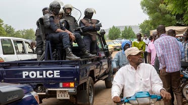 Malian police gather outside the Bourse du Travail where striking workers gathered to protest the arrest of President Bah N'Daw and Prime Minister Moctar Ouane by military personnel in Bamako, Mali, on May 25, 2021. (AP)