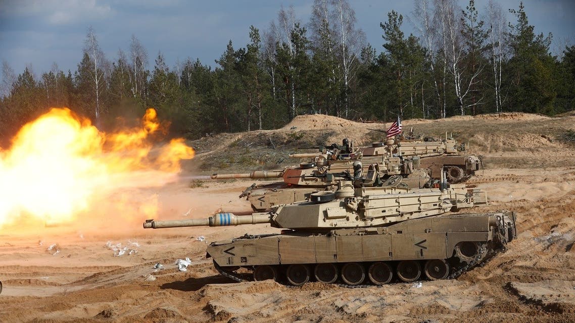 US Army M1A1 Abrams tank fires during NATO enhanced Forward Presence battlegroup military exercise Crystal Arrow 2021 in Adazi, Latvia, on March 26, 2021. (Reuters)
