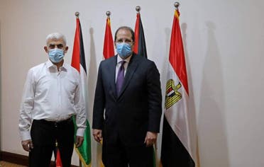 صورة يحي السنوار قيادي حماس مع مدير مخابرات مصر