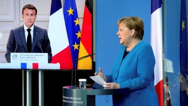French President Emmanuel Macron is seen on a video screen during a joint press conference with German Chancellor Angela Merkel, as part of a virtual Plenary Session of the Franco-German Council of Ministers in Berlin, Germany, May 31, 2021. (File photo: Reuters)