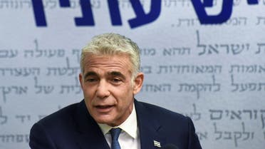 Yair Lapid, head of the centrist Yesh Atid party, delivers a statement to the press before the party faction meeting at the Knesset, Israel's parliament, in Jerusalem May 31, 2021. (Reuters)