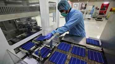 An employee works at a solar cell production line at Jupiter Solar Power Limited (JSPL) plant in Baddi, in the northern state of Himachal Pradesh, India May 29, 2017. Picture taken May 29, 2017. REUTERS/Ajay Verma