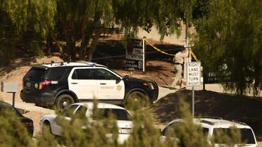 A Los Angeles County Sheriff department vehicle is seen near police tape outside LA County Fire Station 81 after a shooting there left one firefighter dead, in Agua Dulce, California on June 1, 2021. A shooting at a fire station in Agua Dulce on the morning of June 1 left one firefighter dead and another wounded, officials said. (File photo: AFP)