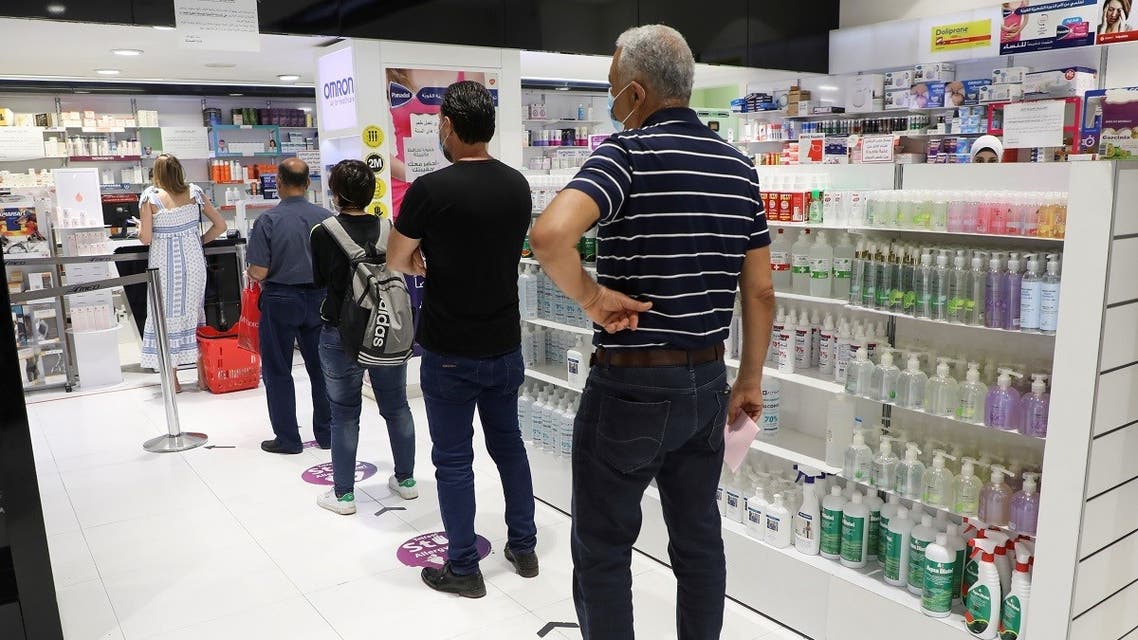 People queue inside a pharmacy in Beirut, Lebanon May 28, 2021. (Reuters/Mohamed Azakir)