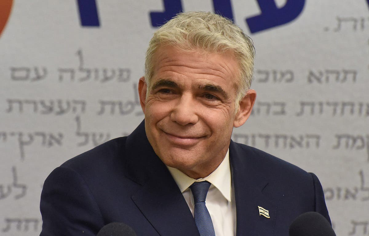 A file photo shows Yair Lapid delivers a statement to the press at the Knesset in Jerusalem on May 31, 2021. (Debbie Hill/AFP)