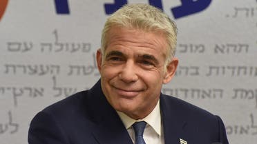 Israel’s centrist opposition leader Yair Lapid delivers a statement to the press at the Knesset (Israeli parliament) in Jerusalem on May 31, 2021. (Debbie Hill/AFP)