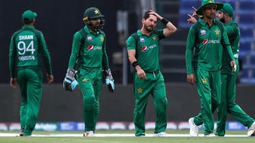 Pakistani cricketer Yasir Shah (C) celebrates with his teammates the dismissal of Australian cricketer Aaron Finch during the third one day international (ODI) cricket match between Pakistan and Australia at Sheikh Zayed Stadium in Abu Dhabi on March 27, 2019. (AFP)