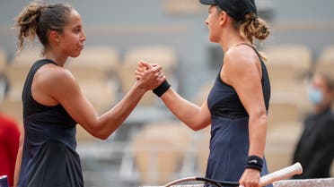 Victoria Azarenka (BLR) at the net with Madison Keys (USA) after their match on day six of the French Open at Stade Roland Garros. (Reuters)