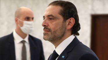 Prime Minister-designate Saad al-Hariri walks after meeting with Lebanon's President Michel Aoun at the presidential palace in Baabda, Lebanon March 22, 2021. (Reuters)