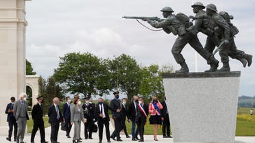 Lord Edward Llewellyn, British Ambassador to France, and France's Defence Minister Florence Parly attend the official opening ceremony of the British Normandy Memorial at Ver-sur-Mer, on the 77th anniversary of D-Day, France, June 6, 2021. REUTERS/Stephane Mahe/Pool