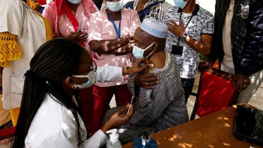 A health worker receives a dose of coronavirus disease (COVID-19) vaccine in Dakar, Senegal February 24, 2021. (Reuters/ Zohra Bensemra)