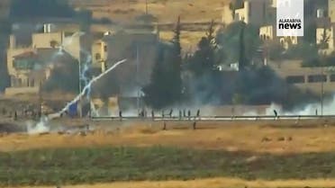 Supporters of banned lawmaker Osama al-Ajarma fired guns near the Jordanian capital Amman. (Screengrab)