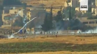 Protesters fire guns near Jordanian capital Amman, police respond with tear gas