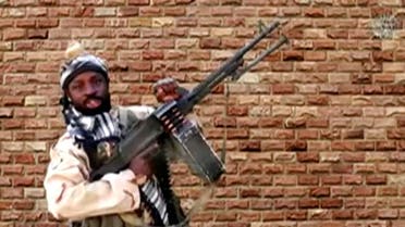 Abubakar Shekau holds a weapon in an unknown location in Nigeria in this still image taken from an undated video obtained on January 15, 2018. Boko Haram Handout/Sahara Reporters via REUTERS ATTENTION EDITORS - THIS IMAGE WAS PROVIDED BY A THIRD PARTY. MANDATORY CREDIT.