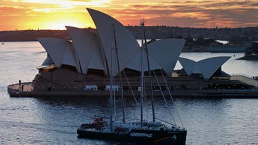 The new Greenpeace Rainbow Warrior ship navigates past the Sydney Opera House March 22, 2013. The ship is on its first visit to Sydney as part of the Save the Reef Australia Tour. (Reuters)