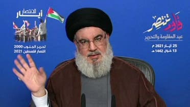 An image grab on May 25, 2021 shows Hassan Nasrallah delivering a televised speech from an undisclosed location in Lebanon. (AFP)