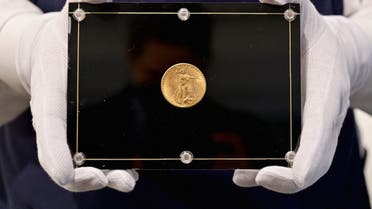 The “Double Eagle” was minted in 1933 and breaks the record for the most expensive coin in the world, set by a 1794 “Flowing Hair” silver dollar that sold for $10 million in 2013. (Angela Weiss/AFP)