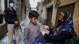Two police officers protecting Pakistan polio vaccination team shot dead