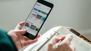 Person browsing through the Coursera app on their smartphone. (Supplied)