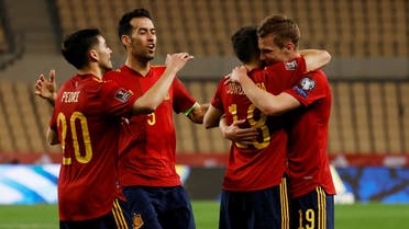 Spain's Dani Olmo celebrates scoring their first goal with Jordi Alba, Pedri and Sergio Busquets. (Reuters)